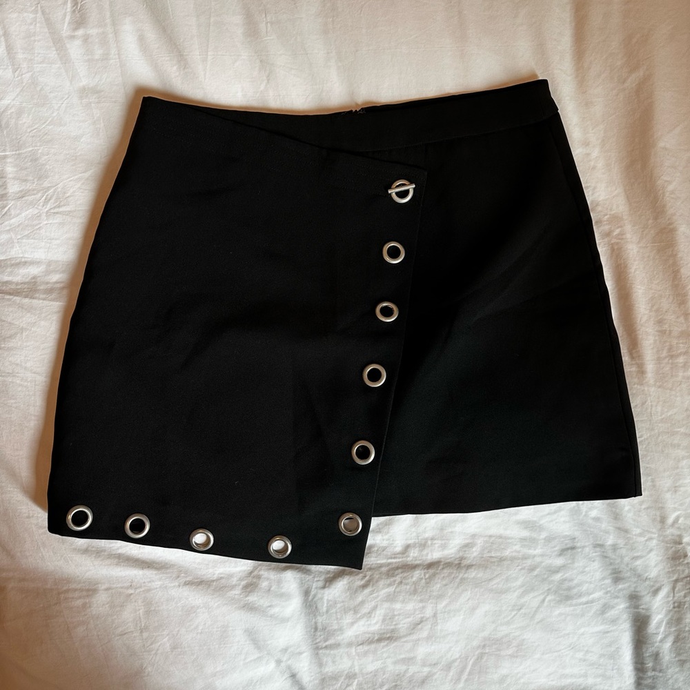 About Us black asymmetrical skort